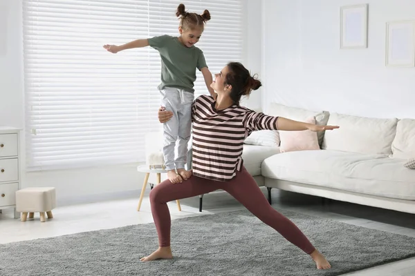 Young Mother Her Daughter Practicing Yoga Together Home — 스톡 사진