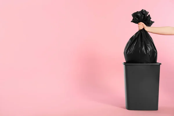 Woman Holding Trash Bag Full Garbage Bucket Pink Background Closeup — Stock Photo, Image