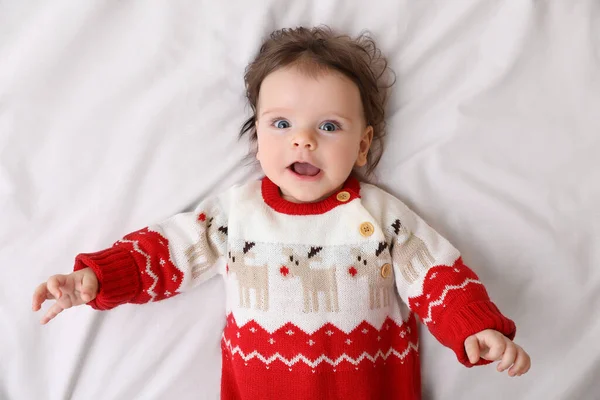 Cute Little Baby Christmas Sweater Soft Bed Top View — Photo