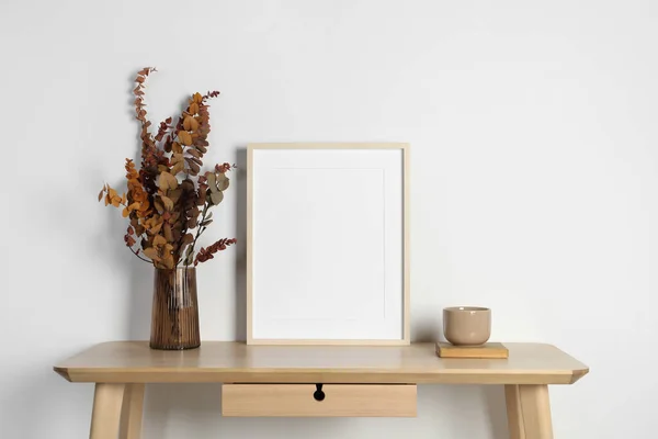 Empty Photo Frame Cup Vase Dry Decorative Leaves Wooden Table — Stock Photo, Image
