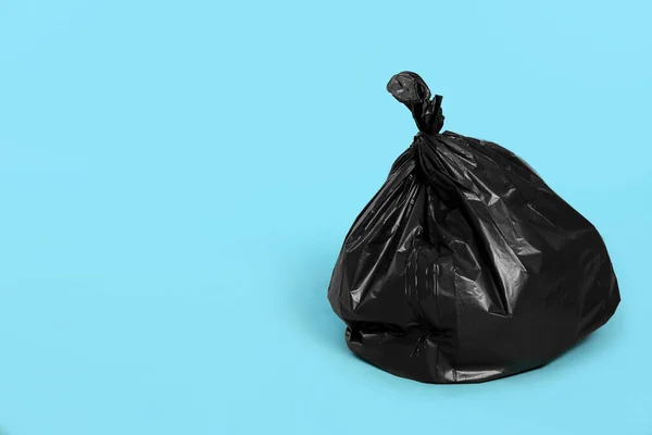 Trash Bag Full Garbage Light Blue Background Space Text — 스톡 사진