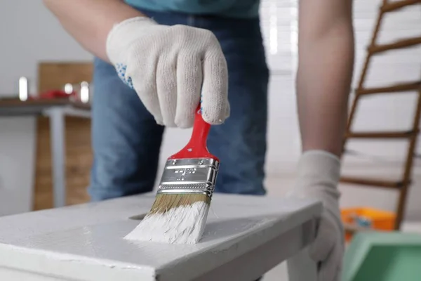 Man Using Brush Paint Bekvam White Dye Indoors Closeup — Stock Photo, Image