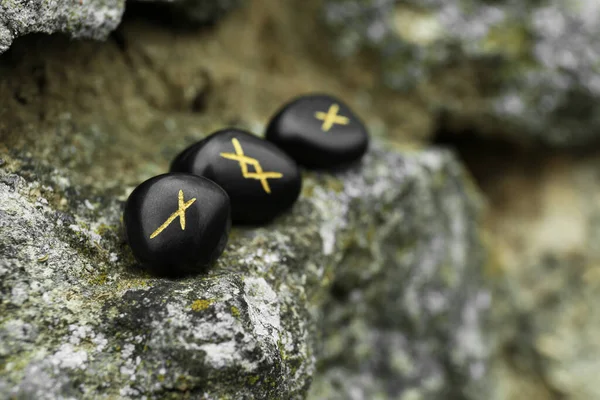 stock image Black runes on stone outdoors, closeup. Space for text