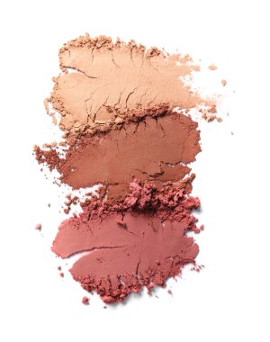 Crushed eye shadows on white background, top view. Professional makeup product