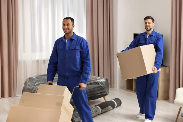 Male Movers Cardboard Boxes New House — 스톡 사진