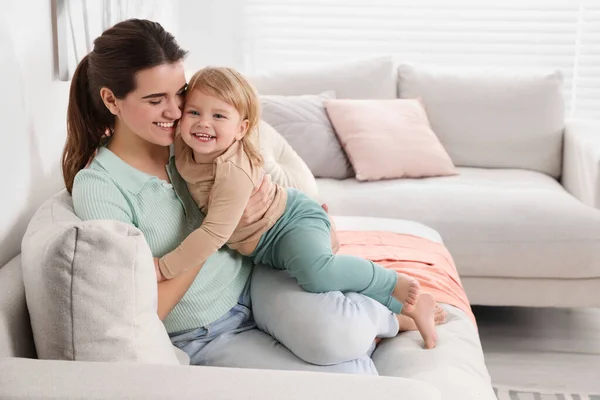 Mother Her Cute Little Daughter Sofa Home Space Text — Stock fotografie