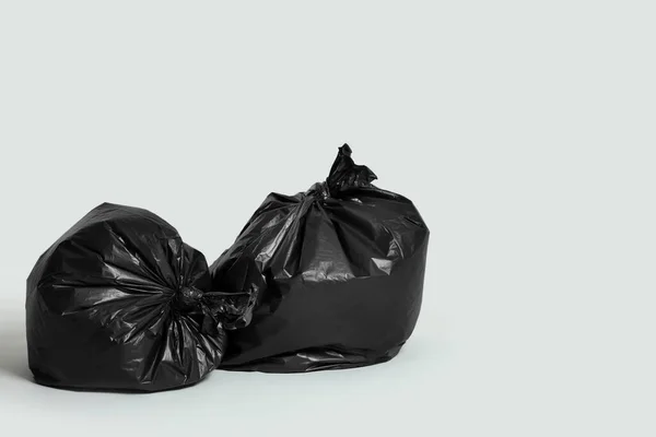 Trash Bags Full Garbage Light Grey Background Space Text — Fotografia de Stock