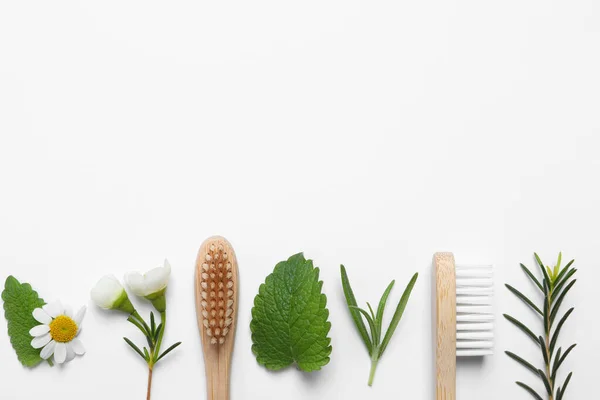Bamboo Toothbrushes Flowers Herbs White Background Flat Lay Space Text — Stock Photo, Image
