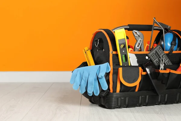 Bag Different Tools Repair Floor Orange Wall Space Text — Stock fotografie