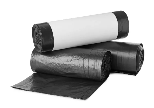 白に隔離された黒いゴミ袋のロール — ストック写真