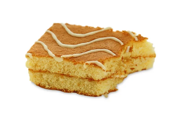 Bitten Heerlijke Spons Cake Geïsoleerd Wit — Stockfoto