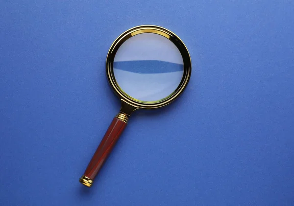 Magnifying Glass Blue Background Top View — Stock Photo, Image