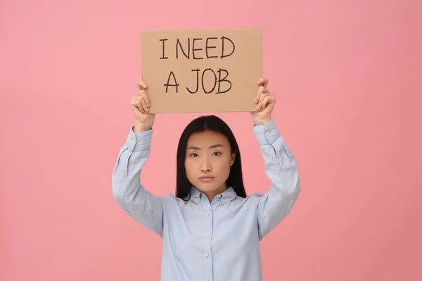 Unemployed Asian Woman Holding Sign Phrase Need Job Pink Background — Stock Photo, Image