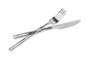 Fork and knife isolated on white. Stylish shiny cutlery set