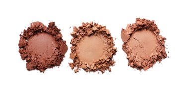 Different crushed eye shadows on white background, top view