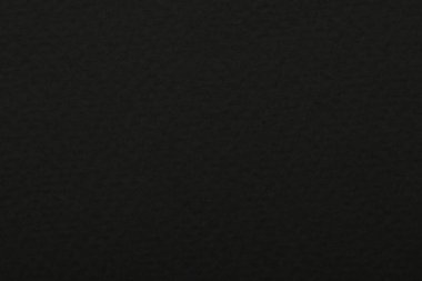 Arkaplan olarak siyah kağıt yaprağının dokusu, üst görünüm