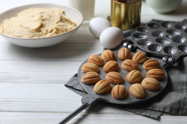 Delicious Walnut Shaped Cookies Condensed Milk Ingredients White Wooden Table — Stock Photo, Image
