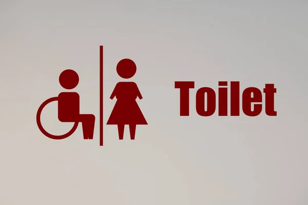 Красный Знак Общественного Туалета Белой Стене — стоковое фото