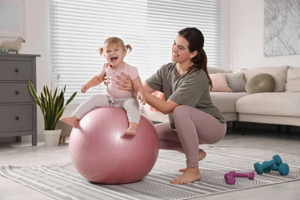 Mother Doing Exercise Her Daughter Fitball Home — Stock Photo, Image