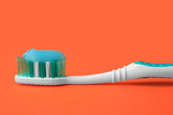 Brush Toothpaste Orange Background Closeup — Stock Photo, Image