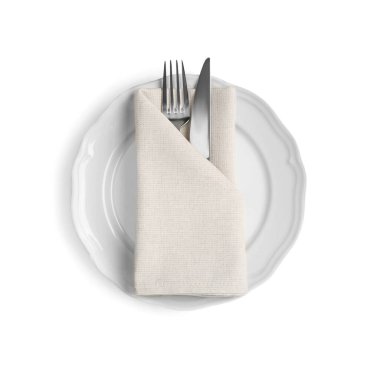 Ceramic plate, fork and knife on white background, top view