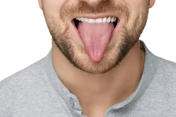 stock image Man showing his tongue on white background, closeup