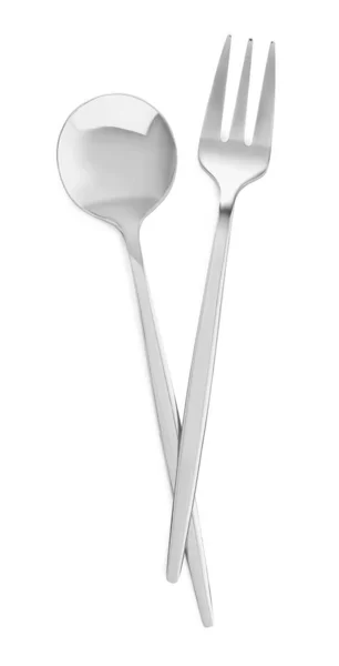 勺子和叉子隔离在白色的顶部视图上 时尚闪亮的餐具套装 — 图库照片