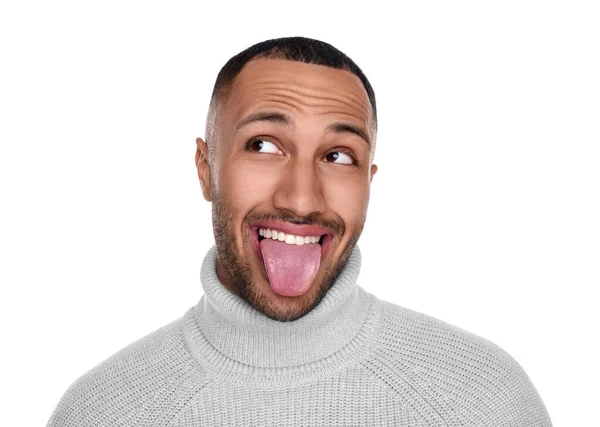 Šťastný Mladý Muž Ukazuje Svůj Jazyk Bílém Pozadí — Stock fotografie