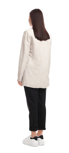 Beyaz Arka Planda Duran Takım Elbiseli Genç Kadını — Stok fotoğraf