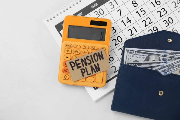 Card Phrase Pension Plan Dollar Banknotes Calculator Calendar White Table — Stock Photo, Image