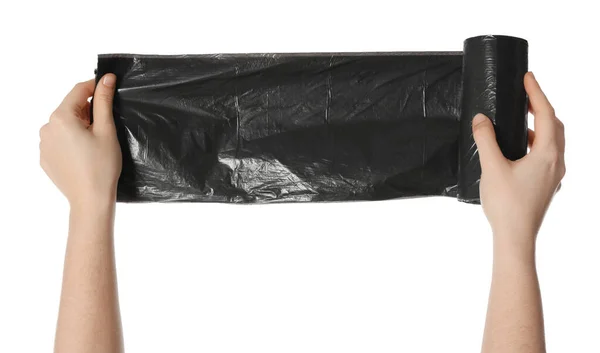 Woman Holding Roll Black Garbage Bags White Background Closeup — Stock Photo, Image
