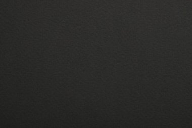 Arka plan olarak koyu gri kağıt yaprağının dokusu, üst görünüm