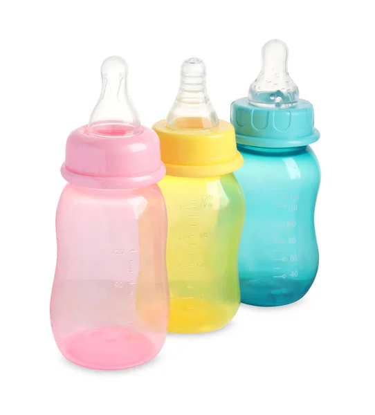 Three empty feeding bottles for baby milk isolated on white