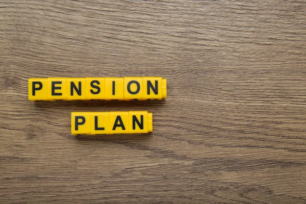Words Pension Plan Made Yellow Cubes Wooden Table Flat Lay — Stock Photo, Image