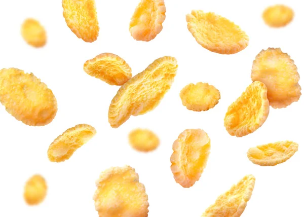 Gouden Cornflakes Vallen Witte Achtergrond — Stockfoto