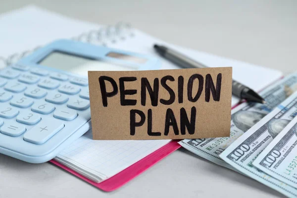 Card Words Pension Plan Banknotes Calculator Notebook White Table Closeup — Stock Photo, Image
