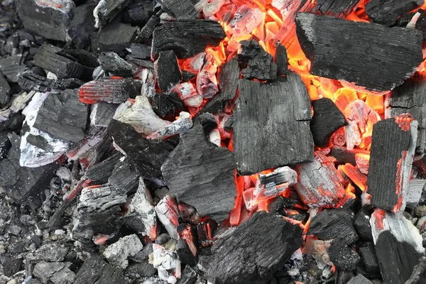 许多烧焦的煤块作为背景 顶视图 — 图库照片