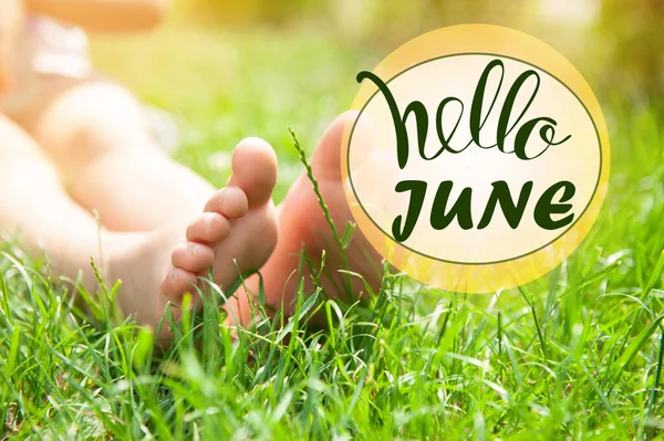 Hello June Child Sitting Barefoot Green Grass Sunny Day Closeup — Stock Photo, Image