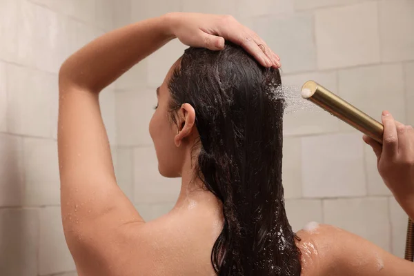 Woman Washing Hair While Taking Shower Home Back View —  Fotos de Stock