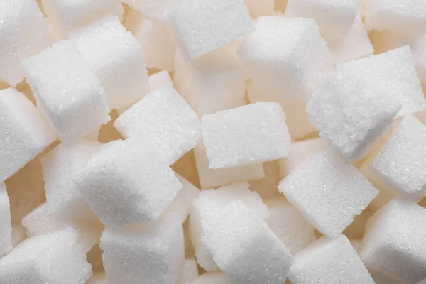 Białe Kostki Cukru Rafinowanego Jako Tło Zbliżenie — Zdjęcie stockowe