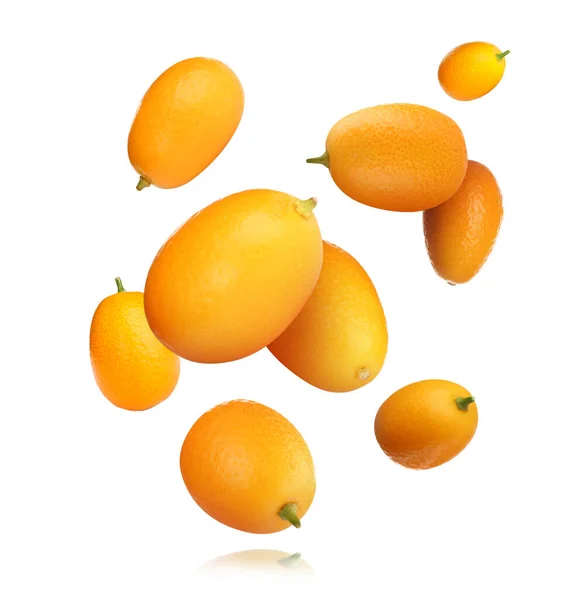 Delicious Fresh Kumquats Falling White Background — Stock Photo, Image