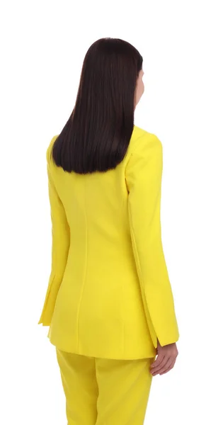 Beyaz Arka Planda Duran Sarı Elbiseli Bir Kadını — Stok fotoğraf