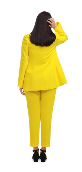 Obchodnice Žlutém Obleku Bílém Pozadí Pohled Zezadu — Stock fotografie