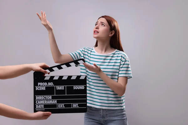 Emotional Actress Performing Role While Second Assistant Camera Holding Clapperboard — Stock Photo, Image