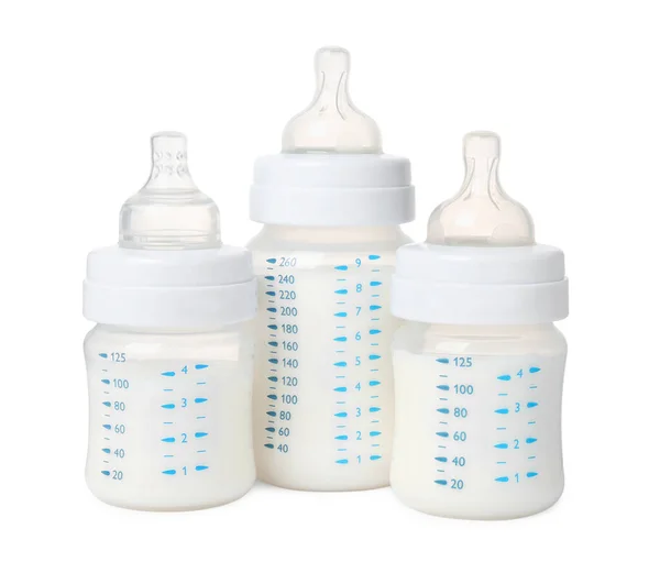 Три Кормящих Бутылки Молоком Белом Фоне — стоковое фото