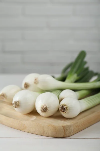 Fresh Green Spring Onions White Wooden Table Space Text — Stock Photo, Image