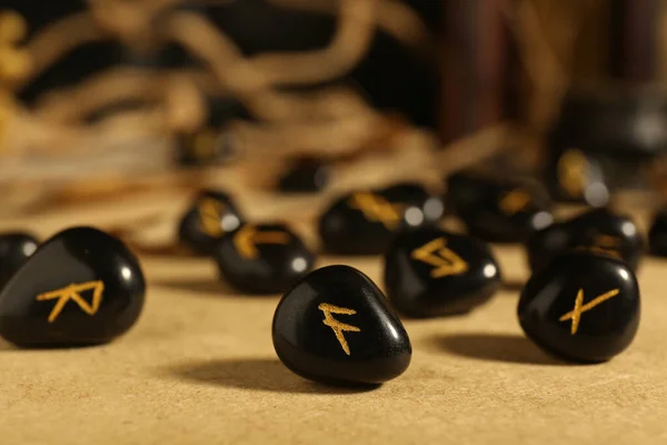 Many Black Rune Stones Wooden Table Closeup — Stock Photo, Image