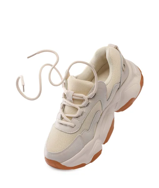 一个时髦的新运动鞋隔离在白色上 — 图库照片