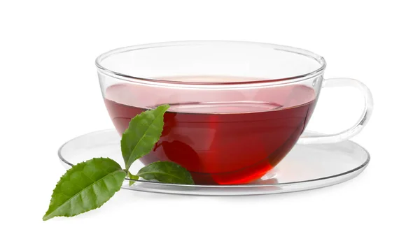 Glasschale Mit Heißem Aromatischen Tee Und Grünen Blättern Auf Weißem — Stockfoto