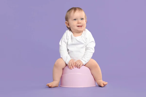 Little Child Sitting Baby Potty Violet Background — Stock Photo, Image